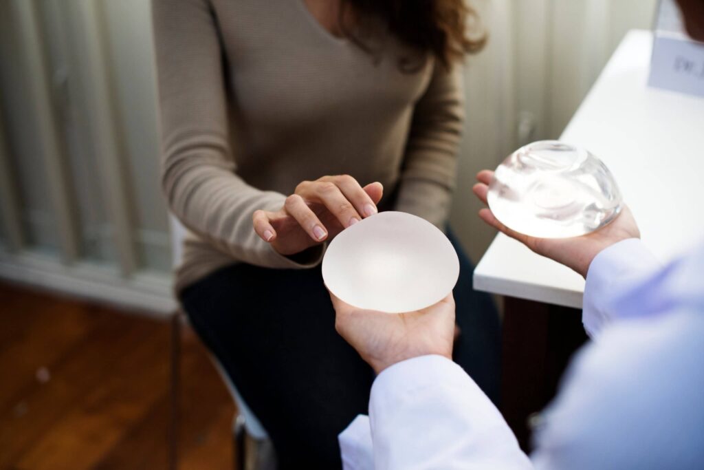 woman deciding on breast implant